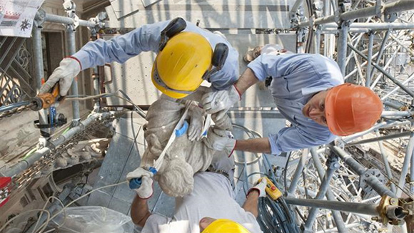 Men at work on the Duomo di Milano